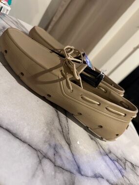 Tucket Giller boat shoes, a type of water-resistant deck shoes with drain holes